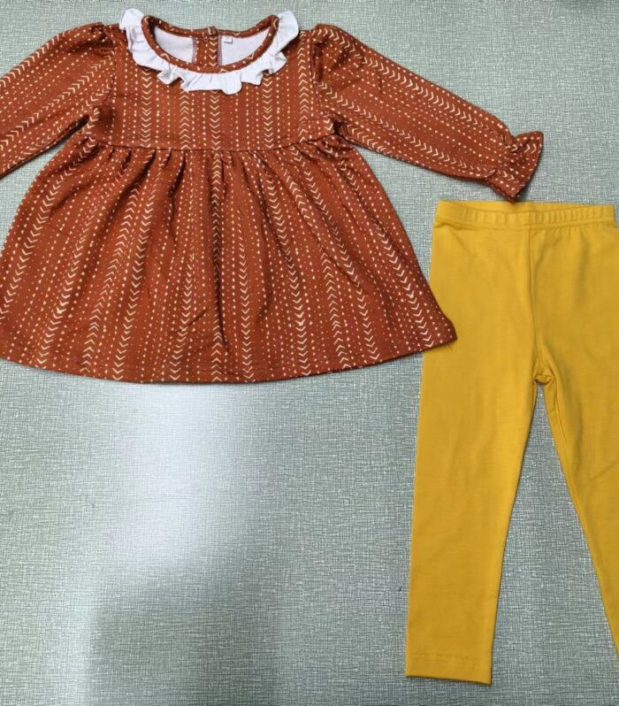 Girls Rust Arrow Print Ruffle Neck Tunic & Solid Yellow Legging Set